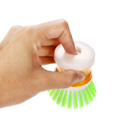 Washing brush with liquid container